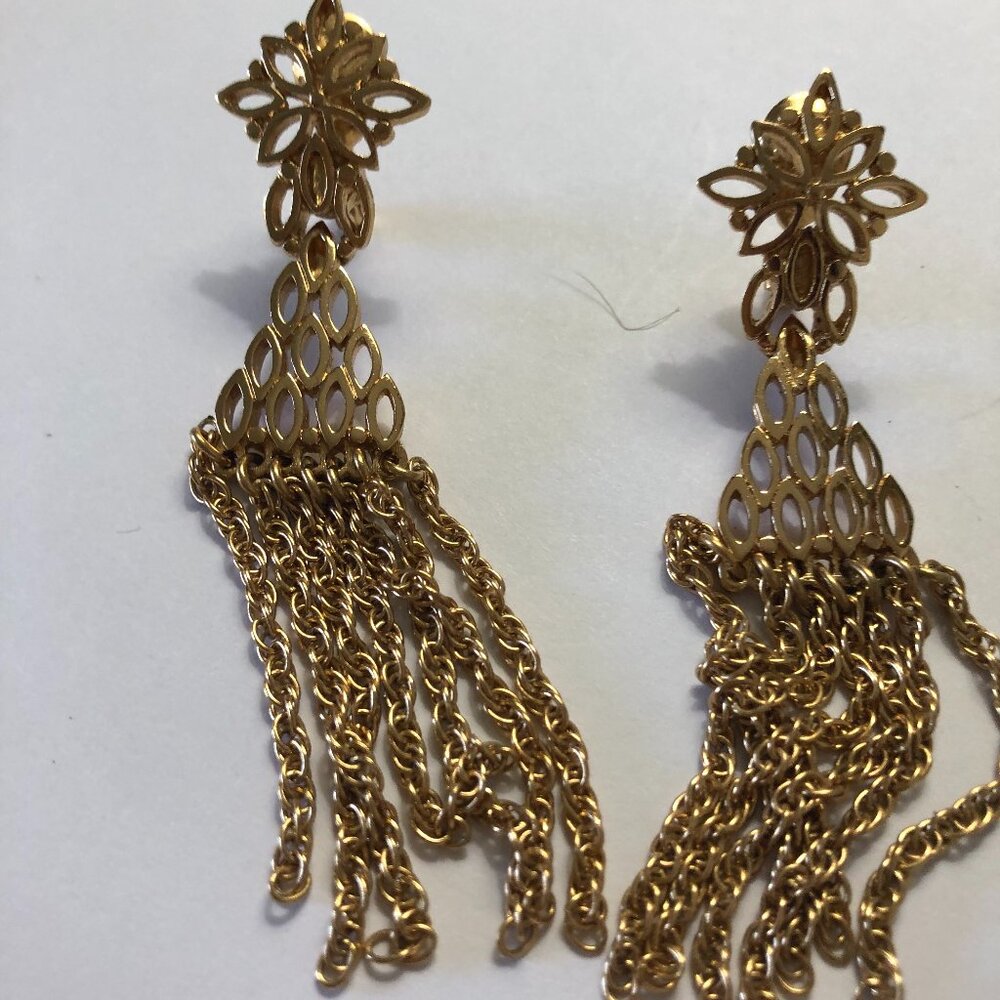 Vintage Monet gold toned clip on earrings filigree top and triangle w/tassels